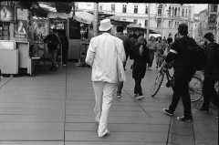 "Graz Street: Gentleman in White." - Camera: Zorki 1, Lense: Jupiter-8 2/50 , Film: Kodak Tri-X.